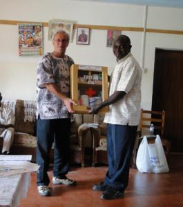 Paul handing over the First Aid Box to Fr. Deo